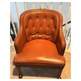 VTG Tufted Leather Armchair with Casters on the