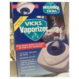 Vicks Warm Steam Vaporizer model V100 or similar