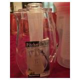 (2) Lucite Pitchers, (1) is a Chill Pitcher