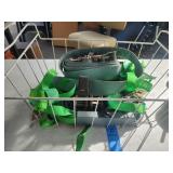 Five ratchet straps in wire basket