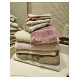 Set of Pink and Cream Colored Towels