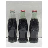 (3) Classic 8 oz 'Hobbleskirt' Style bottles,