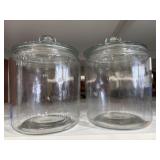 Two glass jars with lids approximately 1 gallon