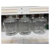 Three glass jars  Two of them with lids