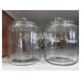 Two glass jars with lids approximately 1 gallon