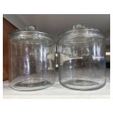 Two glass jars with lids approximately 1 gallon