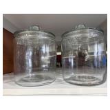 Two glass jars with lids approximately 1 gallon