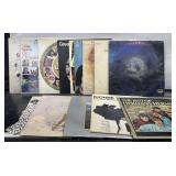 A Collection of (14) Plus Vintage Records