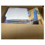 Box Filled with Office Supplies