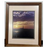 Lighthouse Silhouette Against a Sunset