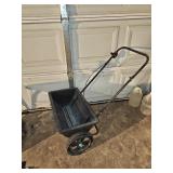 Walk behind drop spreader