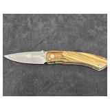 NRA Stone River Pocket Knife features a Distinct