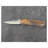 NRA Stone River Pocket Knife Features a