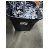 Black Bun Full of Plastic Hangers