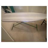 T Leg Ironing Board Features a white striped