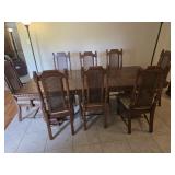 Mid-century Dining Set features a Wooden Table