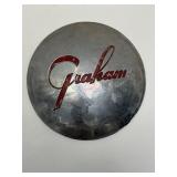 10ï¿½ Graham automobile hubcap, likely dating from