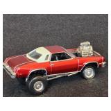 1:64 Johnny Lightning Diecast Car, likely