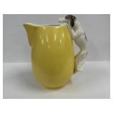 Ceramic Yellow Pitcher Featuring a Dog