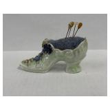 Vintage German porcelain shoe figurine, used as a