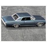 1/64 Scale Die-cast Model of a 1964 Pontiac Grand