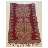 Red and Gold Paisley Textile with Fringed Edges