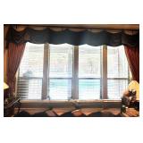 Bronze Toned Curtain Panel Paired with a Dark,