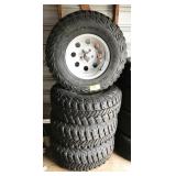 set of 4 tires and Jeep rims, Goodyear Wrangler