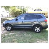 2008 Hundai Santa Fe GLS gray 4-door suv,