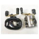 pair of reels: Abu Garcia MX200 & Pro Qualifier