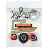 assorted tools: laser level works, light works