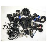 assorted guitar and microphone cabeling
