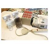 medical encyclopedias, phone, power strip,