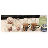 glass and ceramic mugs, honey pot, canister