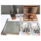 paper cutter, knives, backgammon