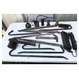 seeders, vise, hammers, saw, pulley, pry bars,