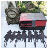 clock, electric hibachi, cowboy wall hooks