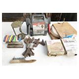 jump starter, pipe guard, clamps, wrenches, tools