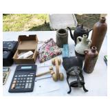 bottles, silver plate coffee pot, calculators,
