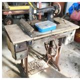 Singer sewing machine in cabinet