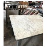 3 tables and assorted folding chairs