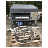 Flow 7S-55 CE Waterjet cutting machine, appears