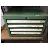 pin gages in green cabinet