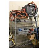 shelf and contents: air hose & reels, electrical,