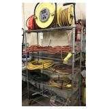 shelf and contents: extension cords shelf and contents: extension cords
