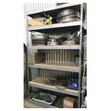 shelf and contents: bandsaw blades, propane torch