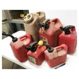 assorted plastic gas cans