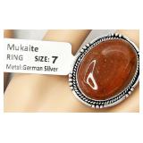 NEW costume ring, size 7, color is "Mukaite" in