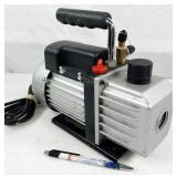small vacuum pump, powers up