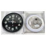 Pair of battery operated clocks